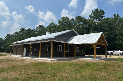 Outside a barndominium, a steel-frame building, constructed using barndo kit.
