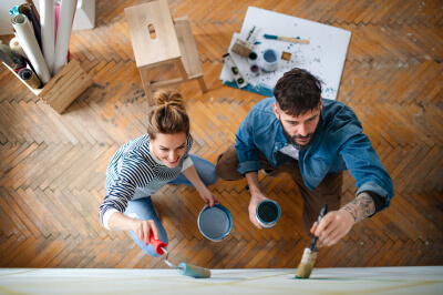 Couple paints while renovating home together in 2023.