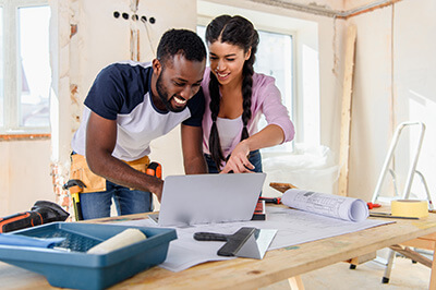 Couple planning while renovating their home