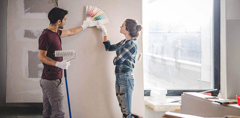 couple choses paint colors for renovatiing their home